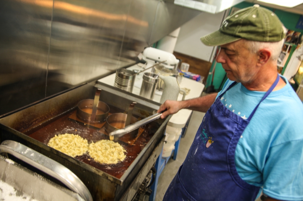Dean Deppe preparing funnel cakes