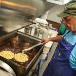 Dean Deppe preparing funnel cakes