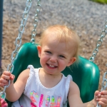 Playing on the swings before the show. Pictured: Coraline Deppe (great-granddaughter of founders William and Alice Beck).