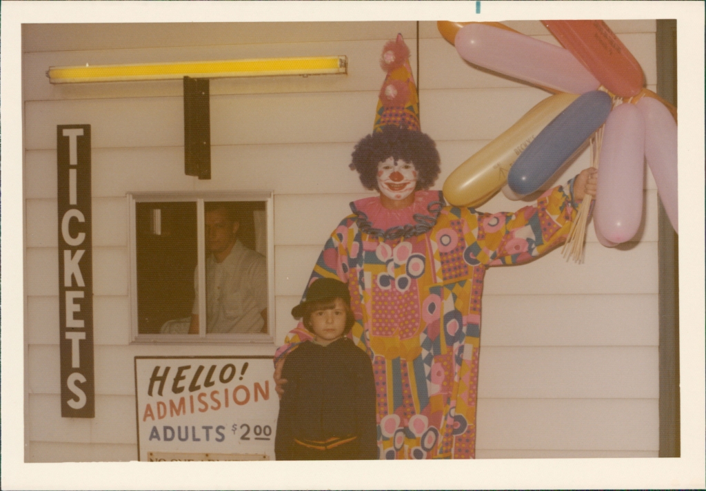 Characters roamed the grounds before the movies began.  The man selling tickets in Dale Beck, William and Alice's son.  The boy posing with the clown is Brian Beck, Dale's son.