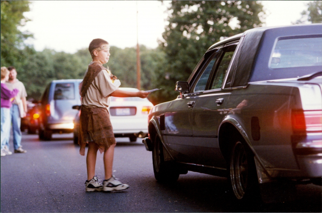 Mac Marino (great-grandson of William and Alice), dressed up as George of the Jungle, handing out flyers to patrons entering the theater.